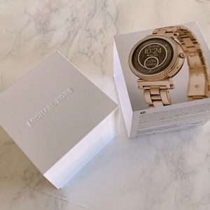 Michael Kors gold face and strap watch. Like brand new in box.